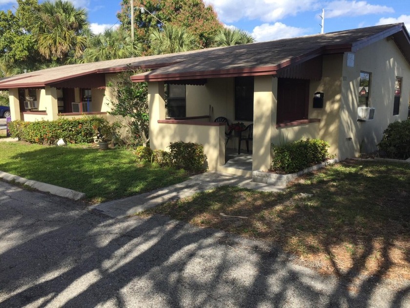 3/2 single family house and a triplex (all 1/1s) for a total of - Beach Home for sale in Riviera Beach, Florida on Beachhouse.com