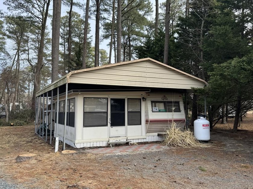 Oversized cul de sac lot with camper with addition, septic, shed - Beach Home for sale in Horntown, Virginia on Beachhouse.com