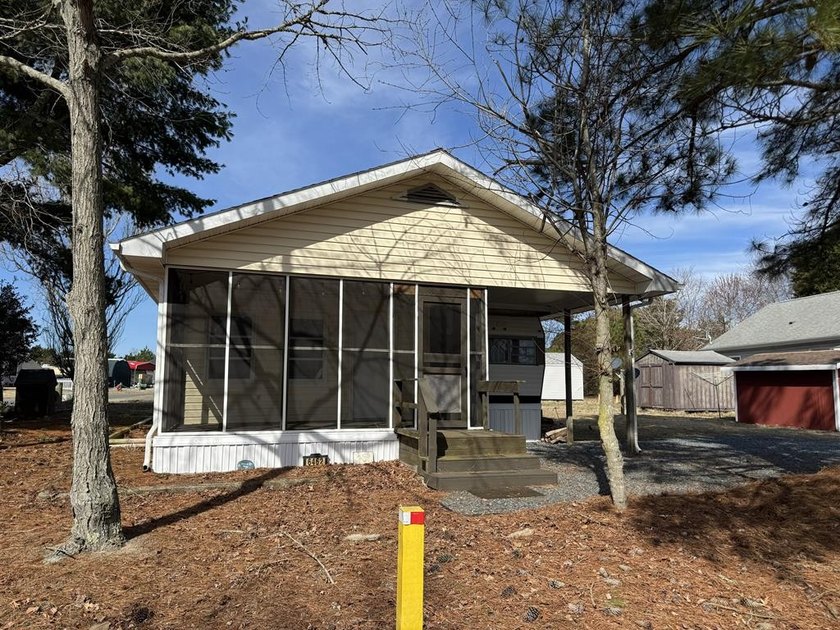 Corner lot in popular Trails End.  Includes camper and addition - Beach Home for sale in Horntown, Virginia on Beachhouse.com