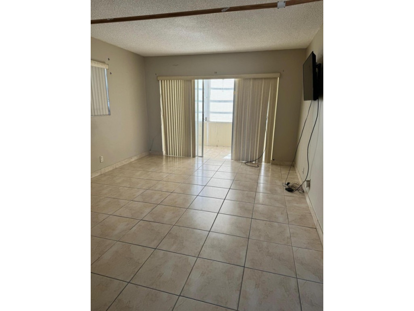 Beautiffully bright and airy corner condo on first floor. You - Beach Condo for sale in Palm Springs, Florida on Beachhouse.com