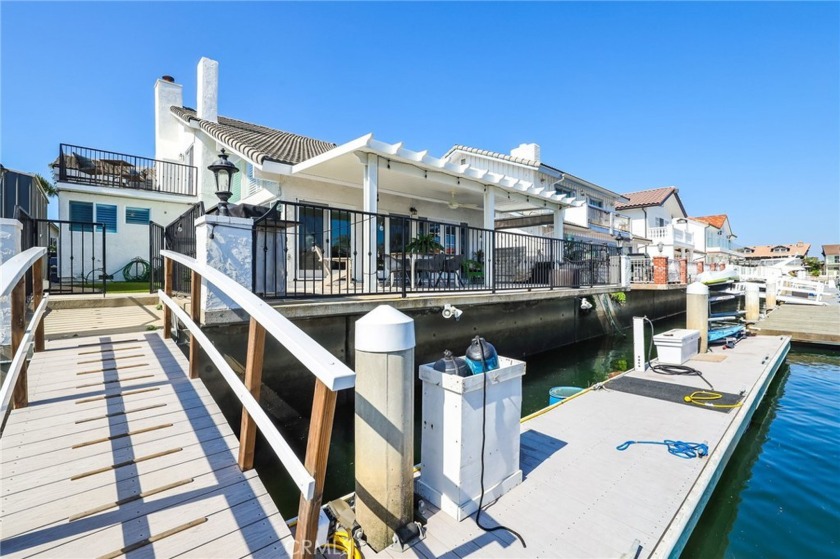 Embrace the waterfront lifestyle on the most private of all the - Beach Home for sale in Huntington Beach, California on Beachhouse.com
