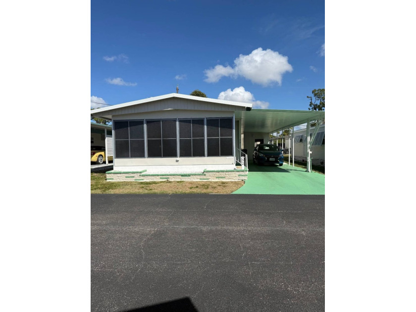 Located in Deer Creek Mobile Home Park, a friendly family-owned - Beach Home for sale in Englewood, Florida on Beachhouse.com