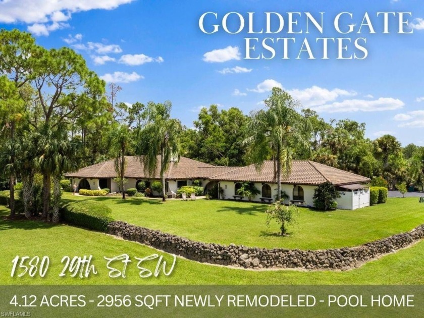 Situated on over 4 acres in Golden Gate Estates, this expansive - Beach Home for sale in Naples, Florida on Beachhouse.com