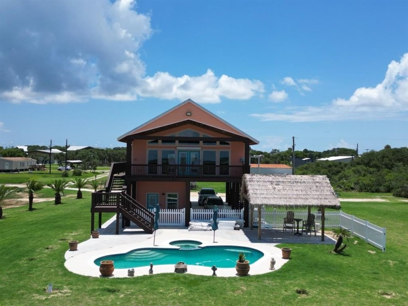 Discover breathtaking views of Matagorda Bay and Powderhorn - Beach Home for sale in Port O Connor, Texas on Beachhouse.com