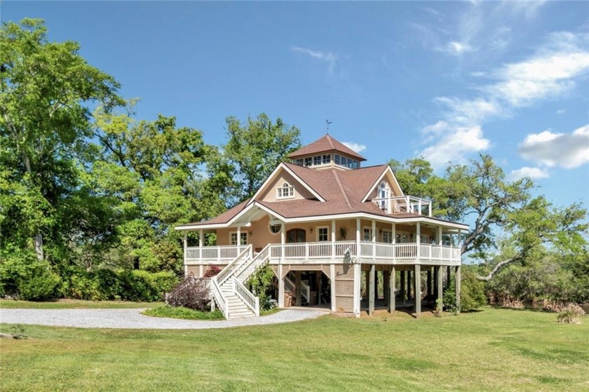 Experience tranquil waterfront living at its finest in this - Beach Home for sale in Mobile, Alabama on Beachhouse.com