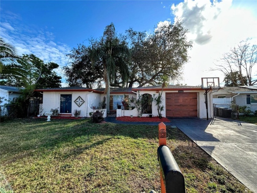 This beautiful home has a spacious, split floor plan with plenty - Beach Home for sale in Holiday, Florida on Beachhouse.com