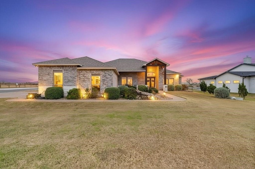 Custom-built in 2021 and absolutely turnkey, this four-bedroom - Beach Home for sale in Taft, Texas on Beachhouse.com
