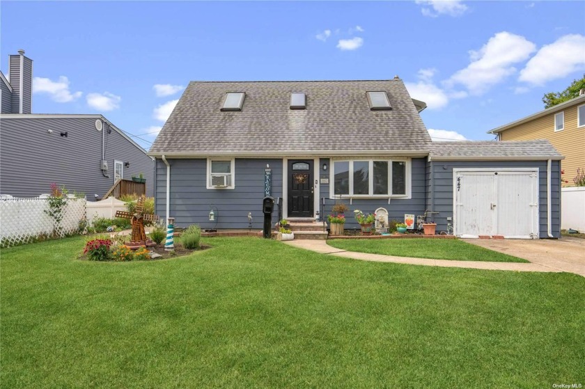 Welcome Home to This Adorable Cape! This Home is Centrally - Beach Home for sale in Lindenhurst, New York on Beachhouse.com