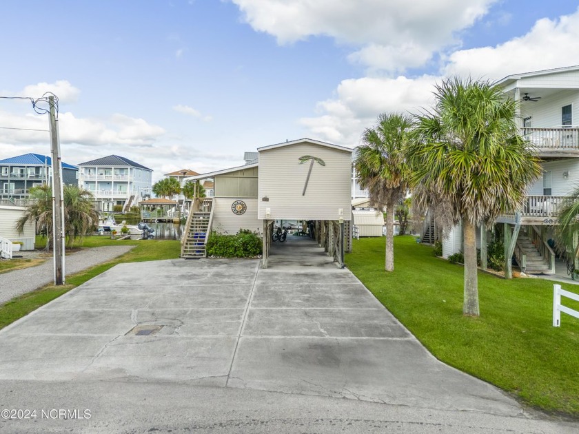 Welcome to coastal living and a boaters paradise! If you love - Beach Home for sale in Surf City, North Carolina on Beachhouse.com