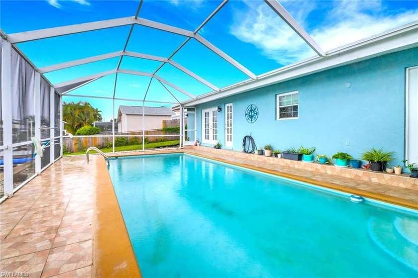 2.65% Assumable Loan + Direct Gulf Access + Heated Pool! This is - Beach Home for sale in North Fort Myers, Florida on Beachhouse.com