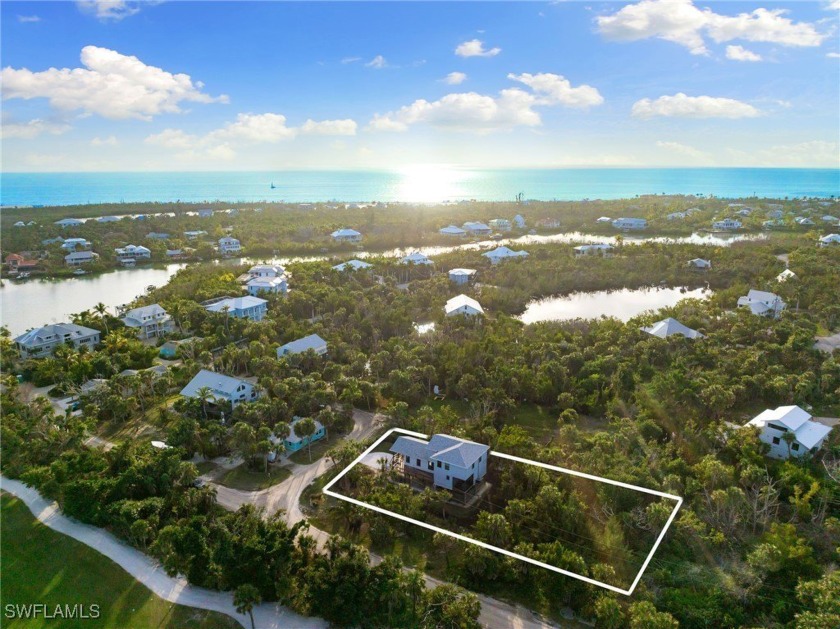 Experience coastal living at its finest in this stunning Sanibel - Beach Home for sale in Sanibel, Florida on Beachhouse.com