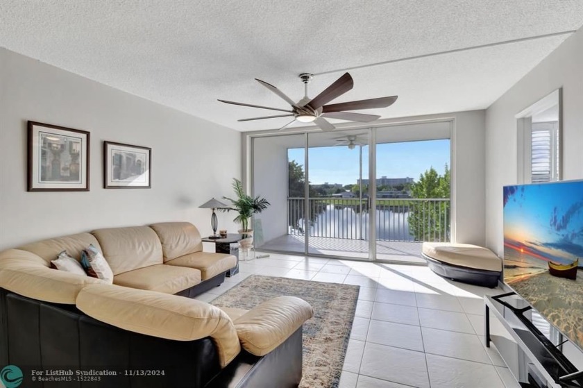 Enjoy serene water views of the lake and fountain as soon as you - Beach Condo for sale in Pompano Beach, Florida on Beachhouse.com