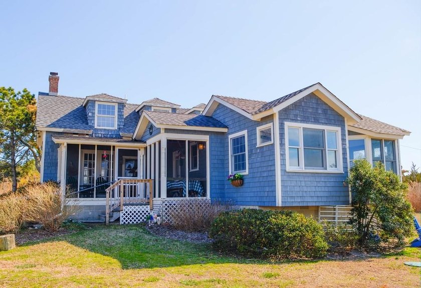 Waterfront Gem with Pier & Sunset Views! Discover the charm of - Beach Home for sale in Chincoteague Island, Virginia on Beachhouse.com