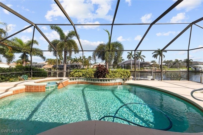 NEW TILE ROOF in 2023. Explore your new spacious home in the - Beach Home for sale in Cape Coral, Florida on Beachhouse.com