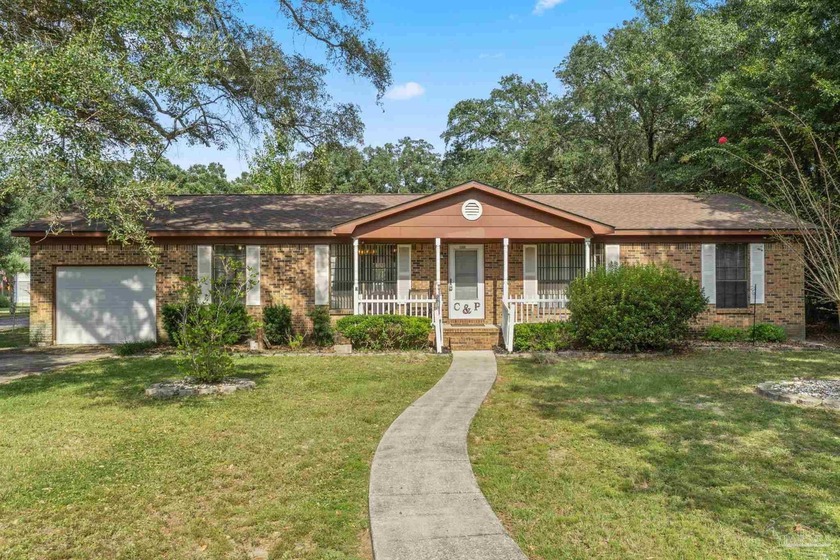 Welcome to this brick ranch-style home offering 3 bedrooms, 2 - Beach Home for sale in Pensacola, Florida on Beachhouse.com