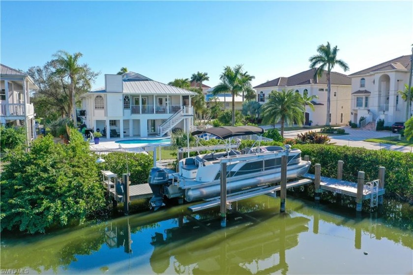 PRICE REFRESH! Offering a quick 3 minute walk to our white sandy - Beach Home for sale in Bonita Springs, Florida on Beachhouse.com