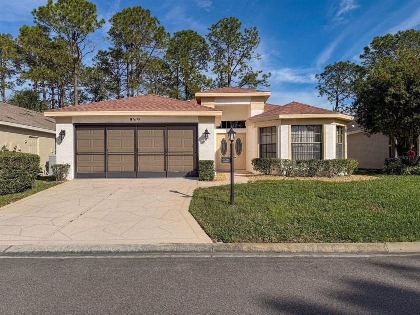 Nestled within the highly sought-after gated golf community of - Beach Home for sale in New Port Richey, Florida on Beachhouse.com