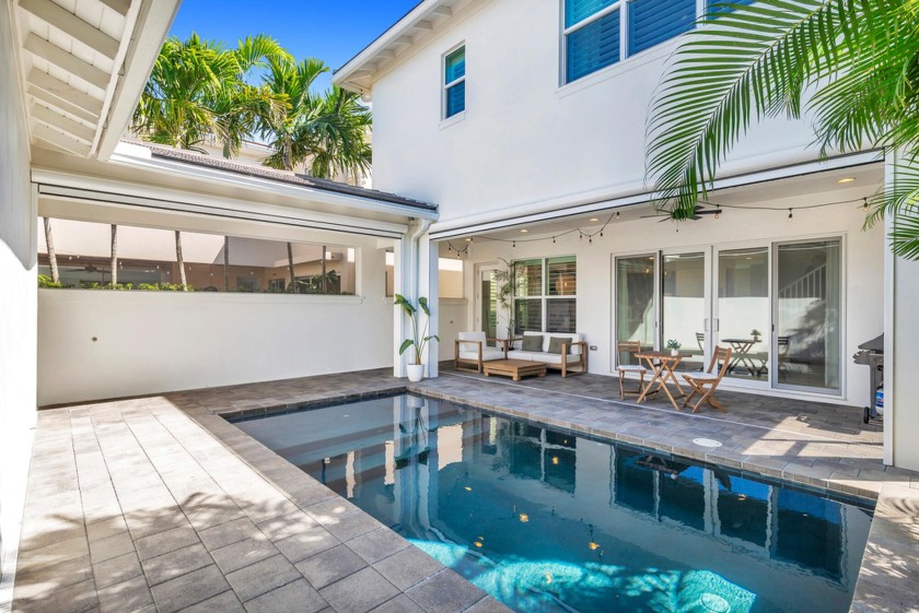 Welcome to a luxurious oasis where contemporary Island style - Beach Home for sale in Palm Beach Gardens, Florida on Beachhouse.com