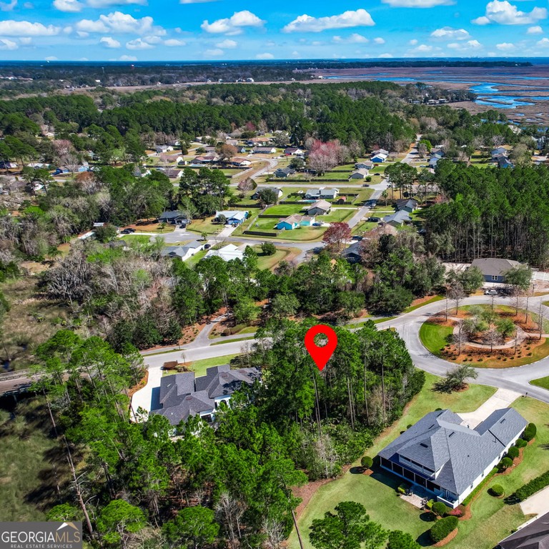 Nestled in the heart of the highly sought-after gated community - Beach Lot for sale in Saint Marys, Georgia on Beachhouse.com