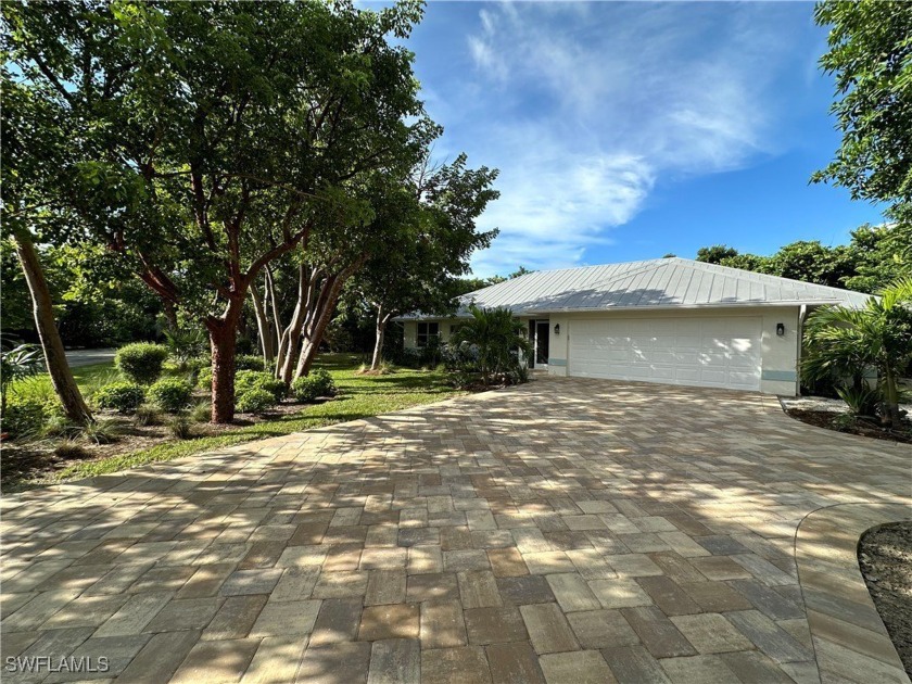 Beautiful Sanibel Bayou home situated on a quiet street sitting - Beach Home for sale in Sanibel, Florida on Beachhouse.com