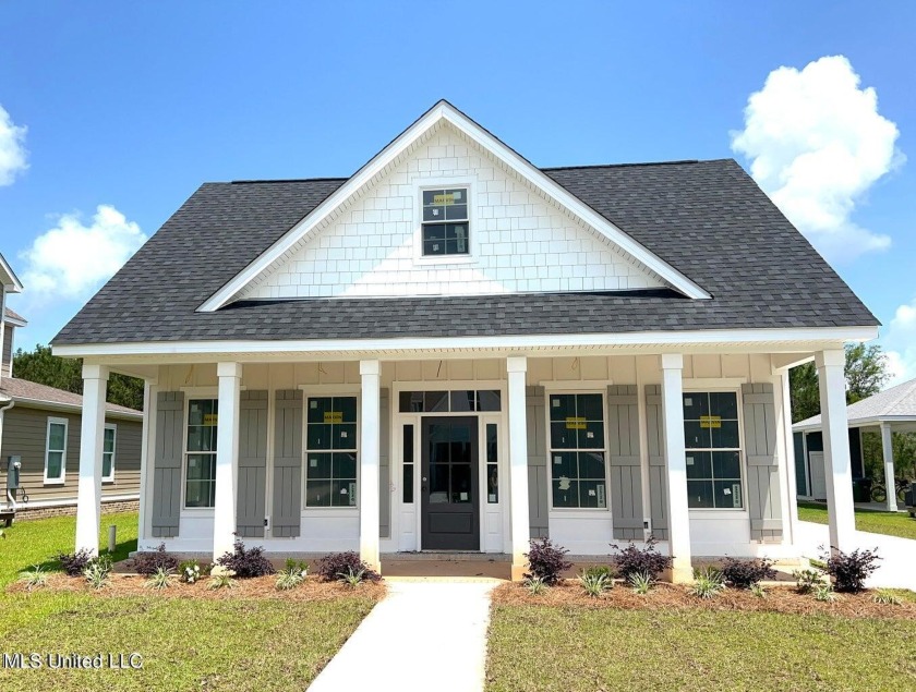 Welcome to your dream coastal retreat in the heart of Oak - Beach Home for sale in Gulfport, Mississippi on Beachhouse.com