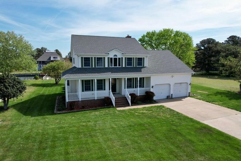 Spacious canal front family home in the highly sought after - Beach Home for sale in Onancock, Virginia on Beachhouse.com