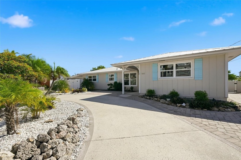 Escape to your own slice of Waterfront Paradise in this old - Beach Home for sale in Holmes Beach, Florida on Beachhouse.com