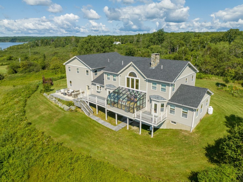This stunning and expansive oceanfront colonial is a unique find - Beach Home for sale in Machiasport, Maine on Beachhouse.com