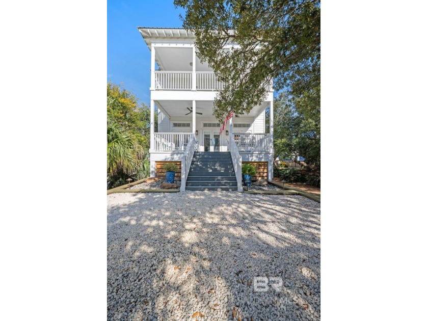 Deeded boat slip and beach access!! This fabulous  Beach Cottage - Beach Home for sale in Orange Beach, Alabama on Beachhouse.com