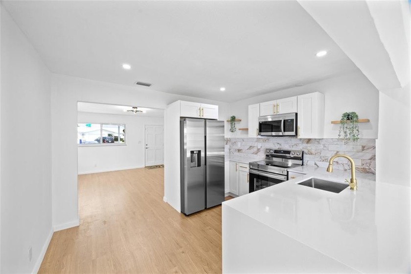 With a brand new roof and all hurricane impact windows... this - Beach Home for sale in Pompano Beach, Florida on Beachhouse.com