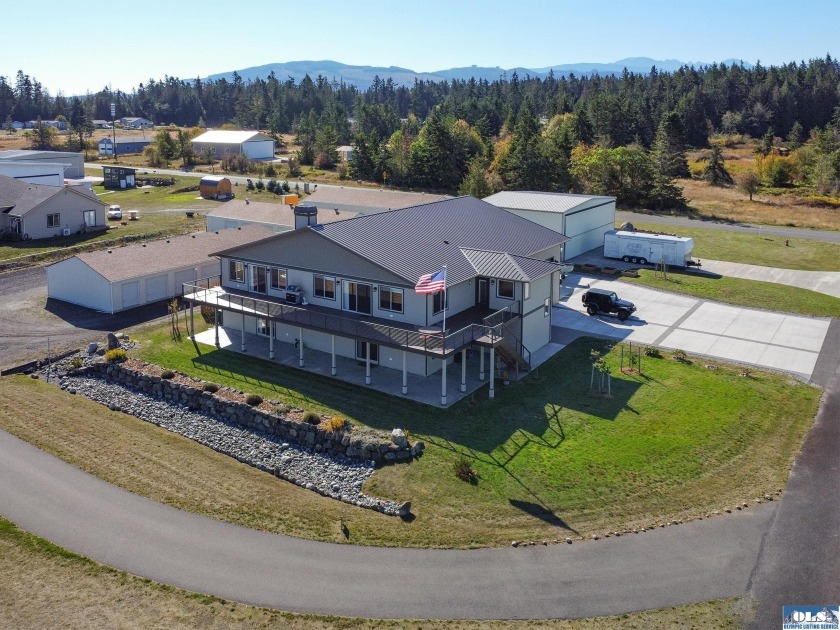 Find aviation heaven in sunny Sequim at home by private Diamond - Beach Home for sale in Sequim, Washington on Beachhouse.com