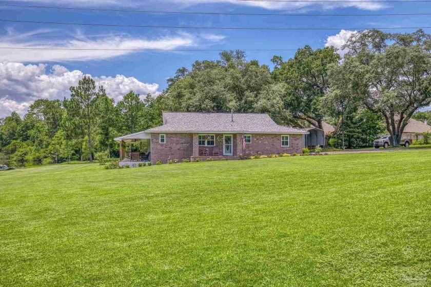 Welcome to this charming home nestled on 1.79 acres, surrounded - Beach Home for sale in Pensacola, Florida on Beachhouse.com