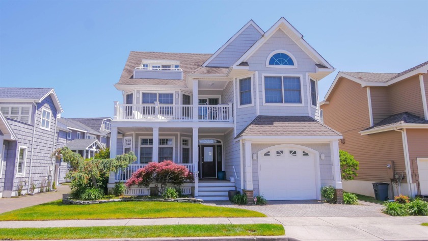 This magnificent 3 story Ocean City Gardens home boasts 3,744 - Beach Home for sale in Ocean City, New Jersey on Beachhouse.com