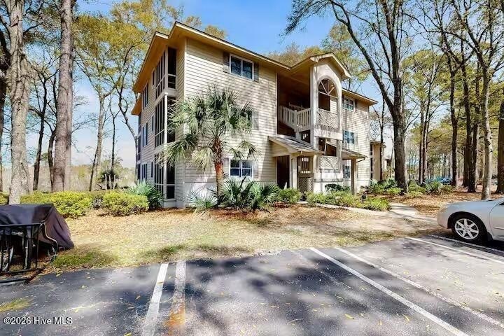 1st Floor Condo!! Beautiful view of the Maples golf course with - Beach Condo for sale in Sunset Beach, North Carolina on Beachhouse.com