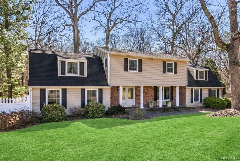 Minutes Away from Northport Village & Beaches! Nestled on - Beach Home for sale in Northport, New York on Beachhouse.com