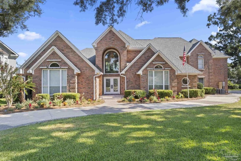 Experience timeless elegance and modern comfort in this luxury - Beach Home for sale in Pensacola, Florida on Beachhouse.com
