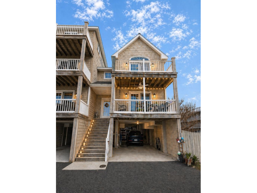 WATERFRONT WITH BOAT SLIP! Coastal living at its finest with - Beach Townhome/Townhouse for sale in Chincoteague Island, Virginia on Beachhouse.com