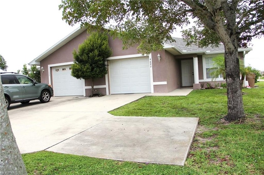 Charming duplex, well-maintained 3-bedroom 2-bath with attached - Beach Home for sale in Cape Coral, Florida on Beachhouse.com