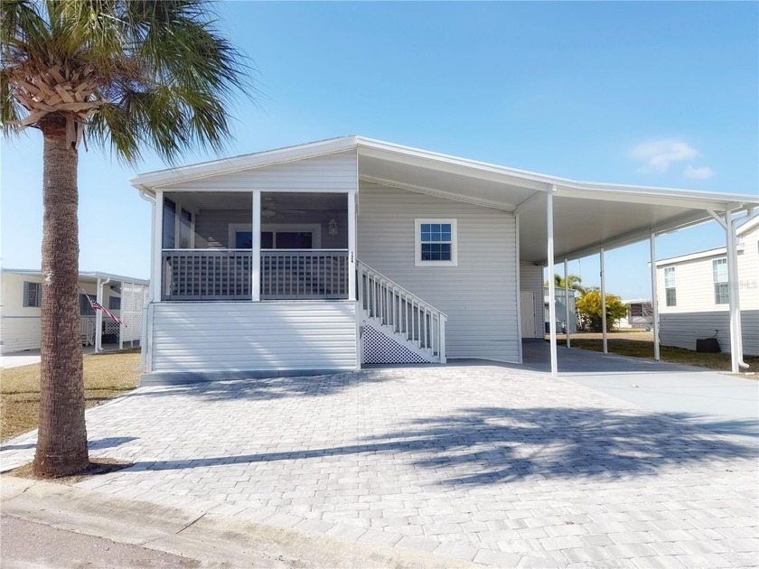 Located in the sought-after Caribbean Isles, this beautifully - Beach Home for sale in Apollo Beach, Florida on Beachhouse.com