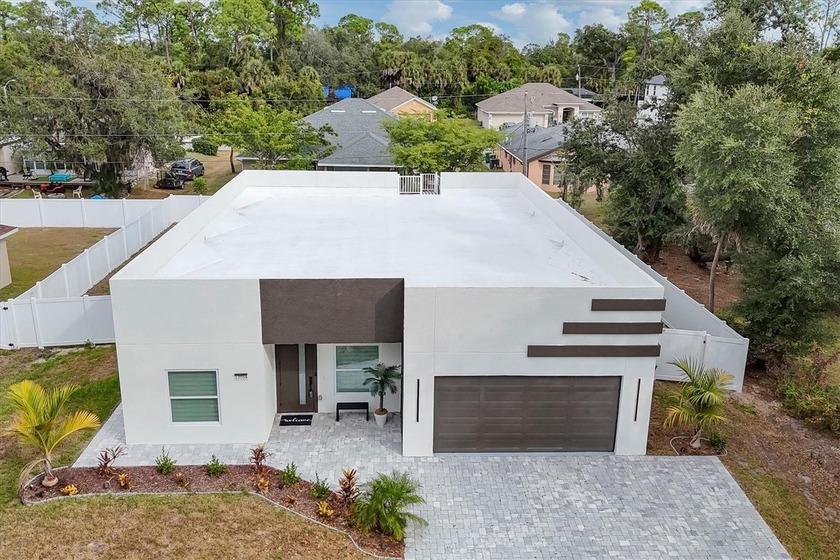 Modern five-bedroom home with in-law suite near Cocoplum Village - Beach Home for sale in Port Charlotte, Florida on Beachhouse.com