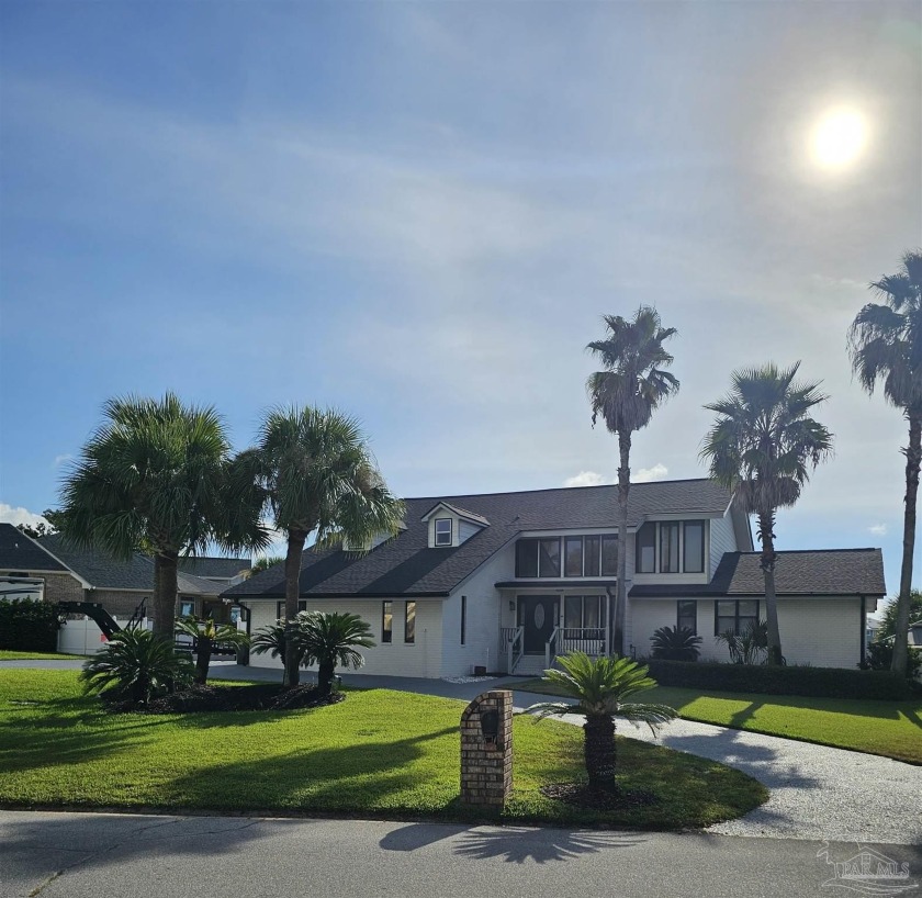 THIS ICONIC GRANDE LAGOON HOME IS LOCATED ON WHAT MAY VERY WELL - Beach Home for sale in Pensacola, Florida on Beachhouse.com