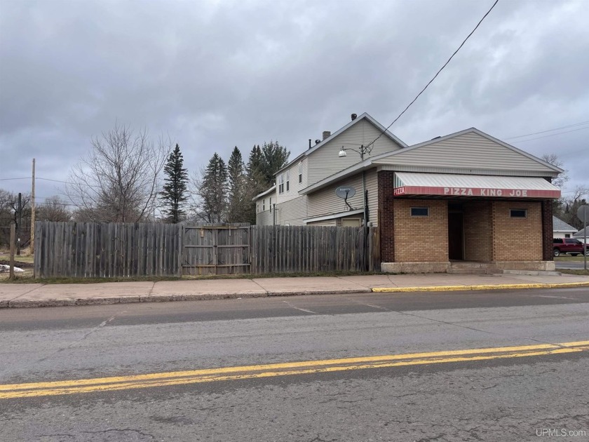 Own a piece of history with endless potential! Step into the - Beach Commercial for sale in Ironwood, Michigan on Beachhouse.com