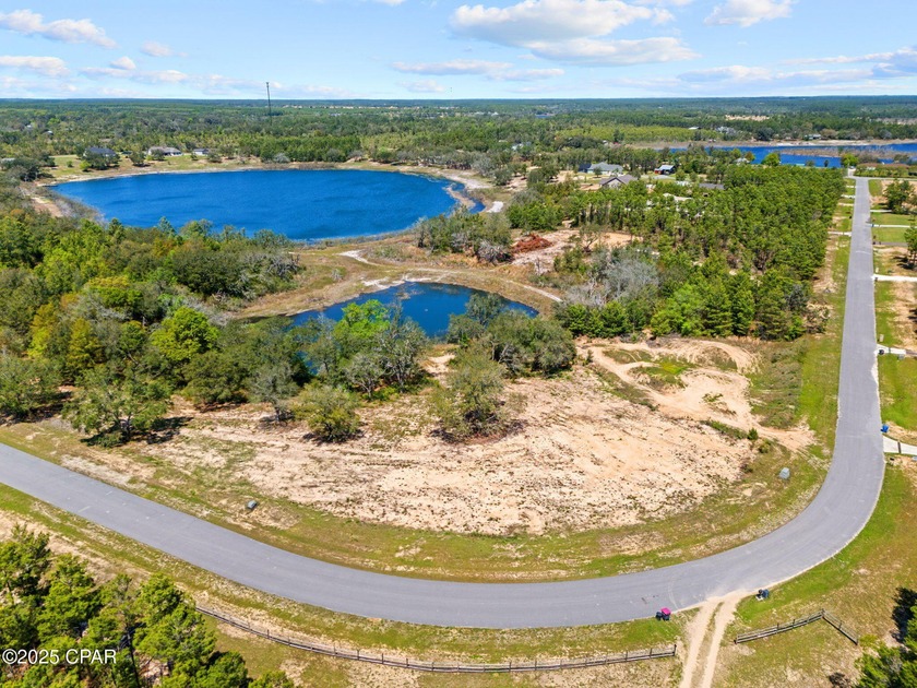 This property is a 4.16-acre waterfront lot in the Bream Pond - Beach Acreage for sale in Panama City, Florida on Beachhouse.com