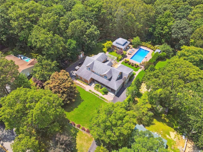 Nestled in North Wading River, this luxurious 4-bedroom, 4 - Beach Home for sale in Wading River, New York on Beachhouse.com