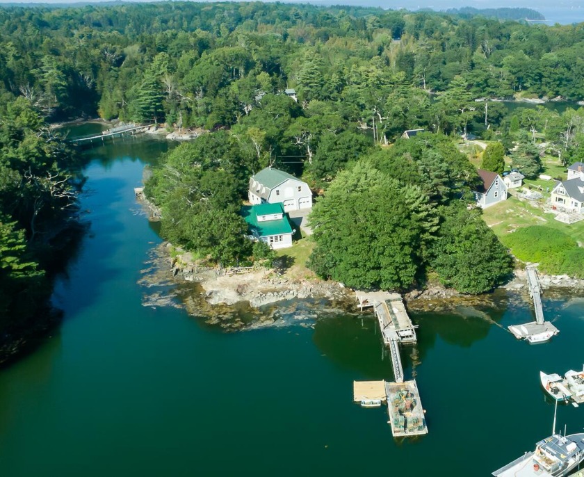 Nestled on the shores of Ridley Cove, this modest 3-bedroom - Beach Home for sale in Harpswell, Maine on Beachhouse.com