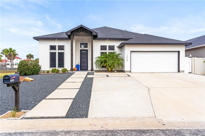 This beautifully designed home truly has it all with five - Beach Home for sale in Corpus Christi, Texas on Beachhouse.com