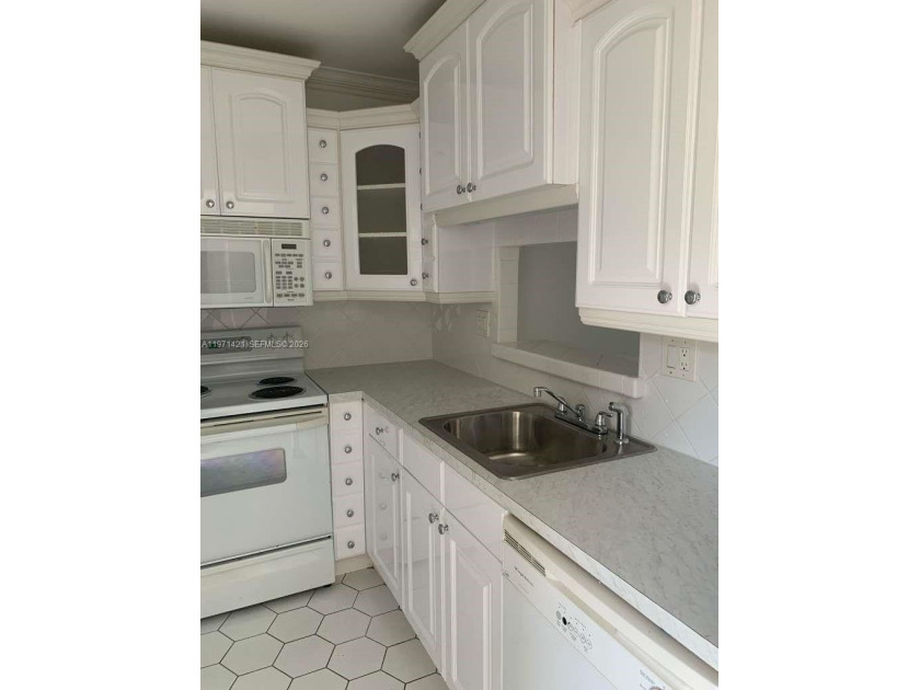 Beautiful 1-bedroom, 1-bath first-floor condo featuring a lovely - Beach Condo for sale in Lauderhill, Florida on Beachhouse.com