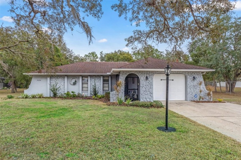 Discover this impeccably maintained 2-bedroom, 2-bathroom pool - Beach Home for sale in Spring Hill, Florida on Beachhouse.com