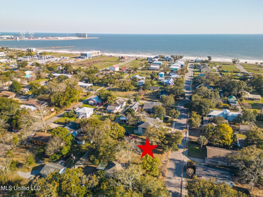 Nestled in the heart of Gulfport, this picturesque double lot is - Beach Lot for sale in Gulfport, Mississippi on Beachhouse.com