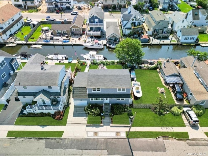 Welcome to your dream waterfront retreat in the coveted - Beach Home for sale in Lindenhurst, New York on Beachhouse.com